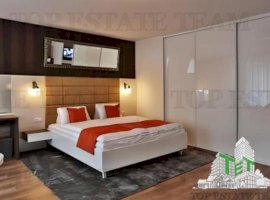 Hotel + spatii comerciale