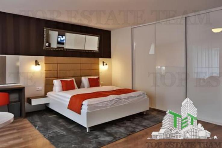 Hotel + spatii comerciale