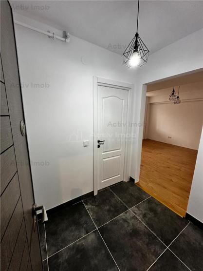 Apartament cu 2 camere, situat ultracentral, proaspat renovat, cu centrala termica si loc de parcare