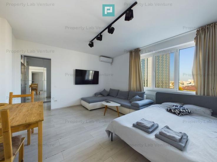 Apartament renovat la 1 minute de Metrou Piata Romana