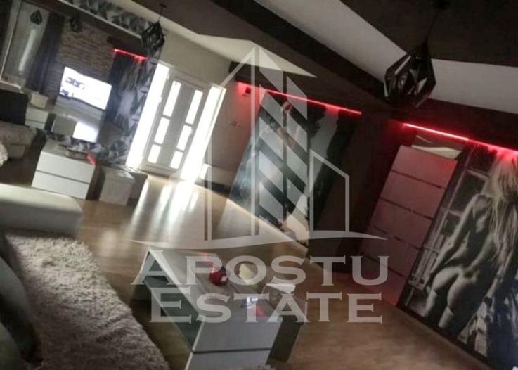 Casa individuala cu 7 camere si hala service,teren 600 mp,Dambovita