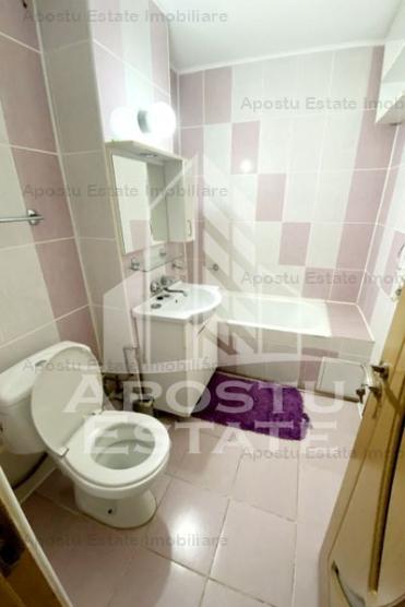 Apartament cu 2 camere decomandat 76 mp,centrală proprie,zona Alfa