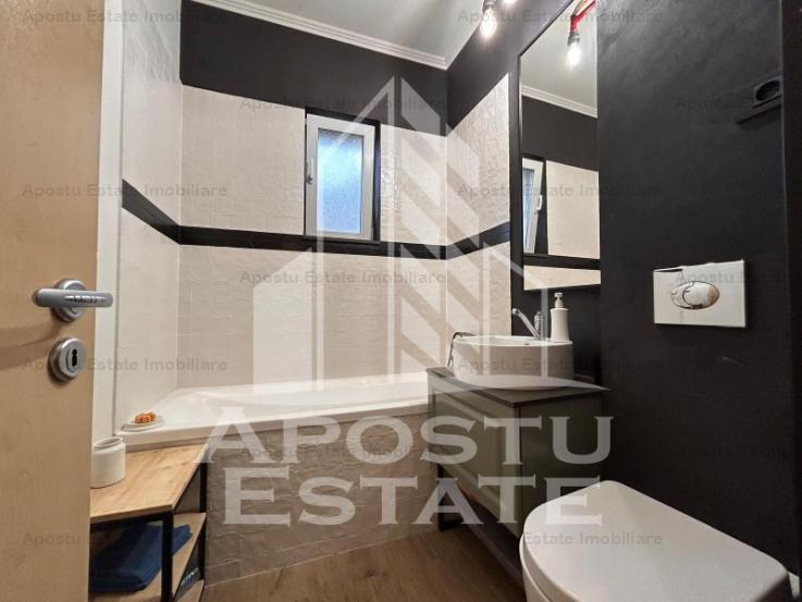 Apartament 4 camere, etaj intermediar cu garaj si boxa in Balcescu