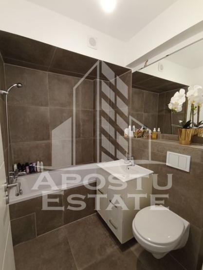 Apartament cu 3 camere, tip penthouse, loc de parcare, zona Crisan