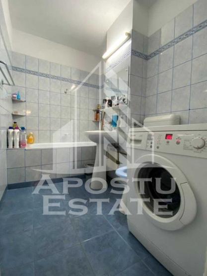 Apartament cu 3 camere, decomandat, centrala proprie