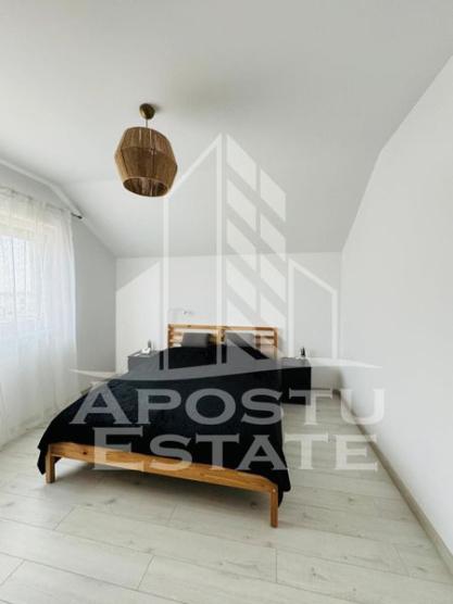 Apartament modern cu 2 locuri de parcare și pod mansardabil