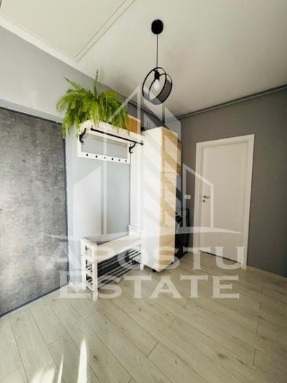 Apartament modern cu 2 locuri de parcare și pod mansardabil