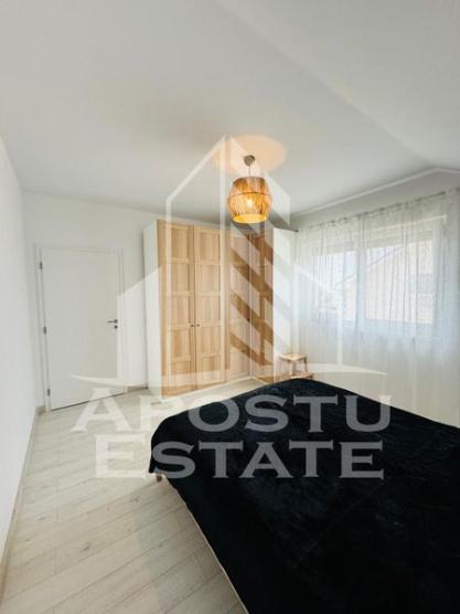 Apartament modern cu 2 locuri de parcare și pod mansardabil