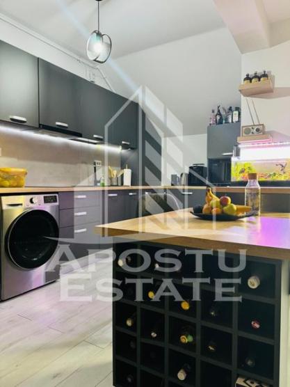 Apartament modern cu 2 locuri de parcare și pod mansardabil