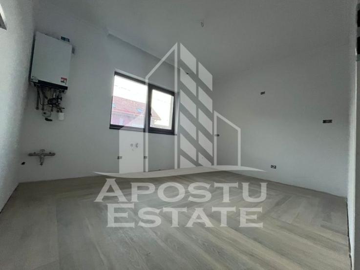 Duplex cu 4 camere, 3 bai,teren 250 mp in zona Dambovita