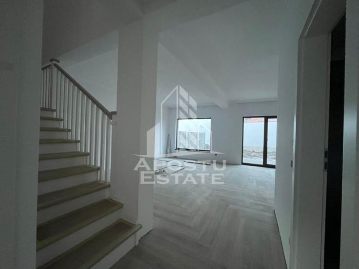 Duplex cu 4 camere, 3 bai,teren 250 mp in zona Dambovita