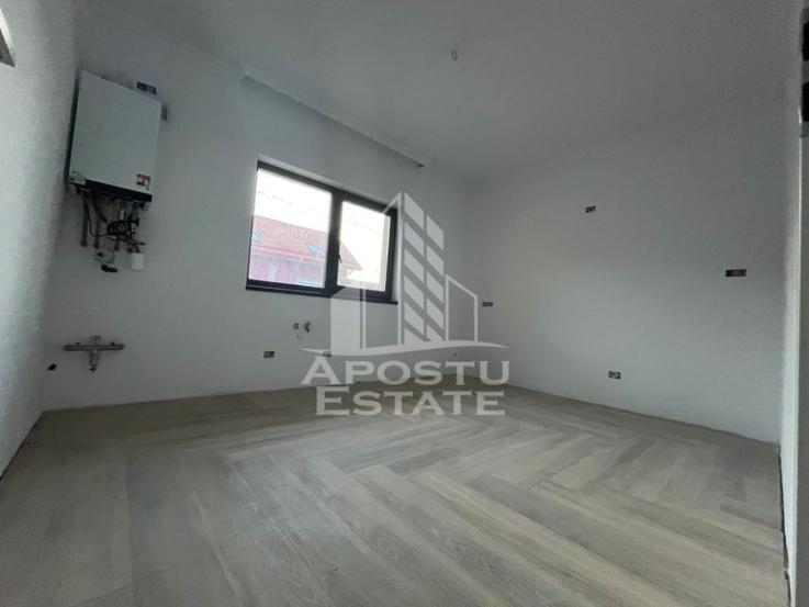 Duplex cu 4 camere, 3 bai,teren 250 mp in zona Dambovita