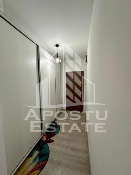 Apartament modern cu 2 camere,  curte privata, in zona Aradului