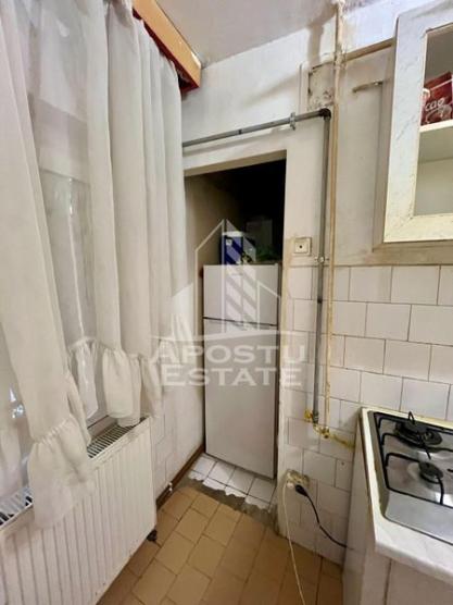 Apartament 1 camera,parter,centrala proprie,zona Timocului