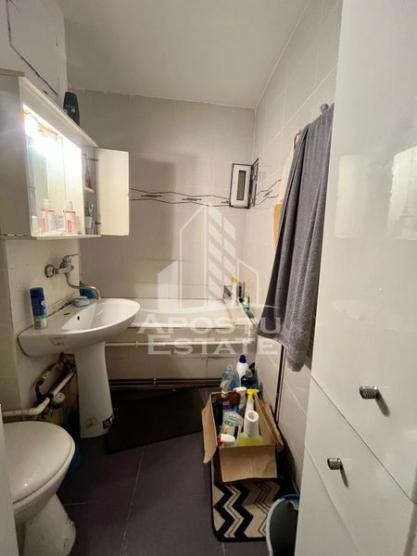 Apartament 1 camera,parter,centrala proprie,zona Timocului