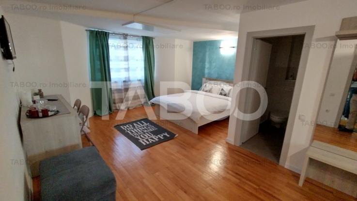 Casa 3 nivele cu etajele 1 si 2 afacere in regim hotelier Strand