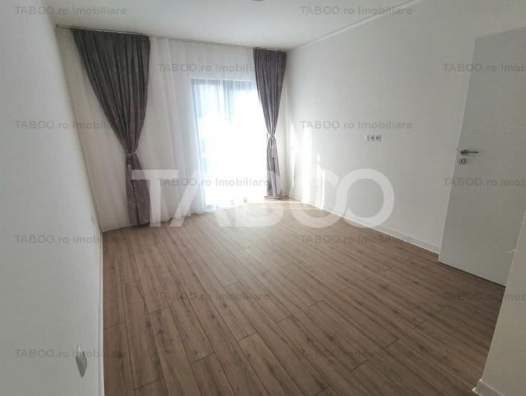 Casa de vanzare 118 mpu cu 4 camere 2 bai si balcon in Cristian Sibiu