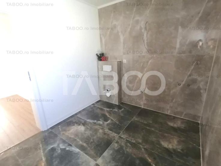 Casa de vanzare 118 mpu cu 4 camere 2 bai si balcon in Cristian Sibiu