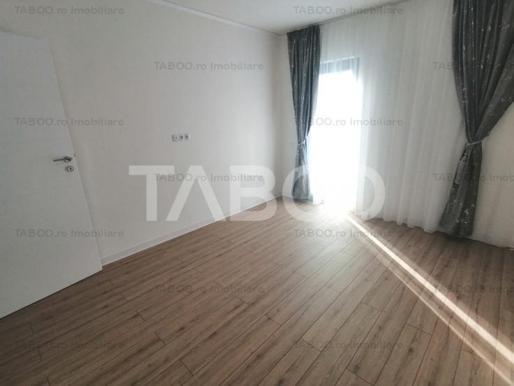 Casa de vanzare 118 mpu cu 4 camere 2 bai si balcon in Cristian Sibiu