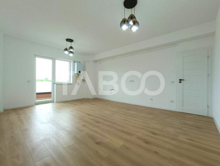 Apartament 3 camere cu loc de parcare si 2 blacoane etaj intermediar