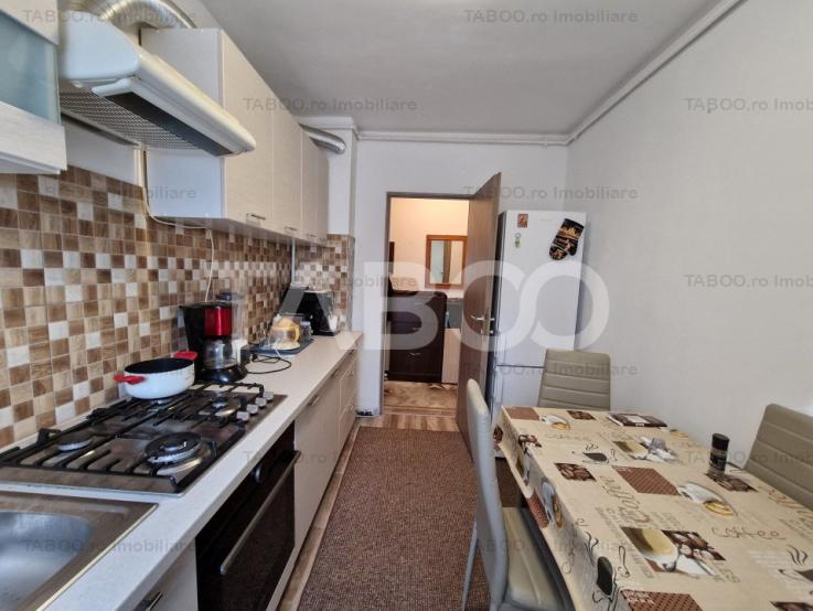 Apartament de vanzare cu 3 camere etaj 1 cu pivnita zona Rahovei Sibiu