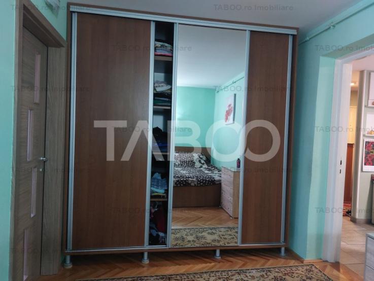 Apartament la casa sub pretul de piata 4 camere pivnita garaj Cisnadie