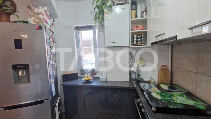 Apartament 3 camere cu 2 balcoane garaj parcare si curte Turnisor