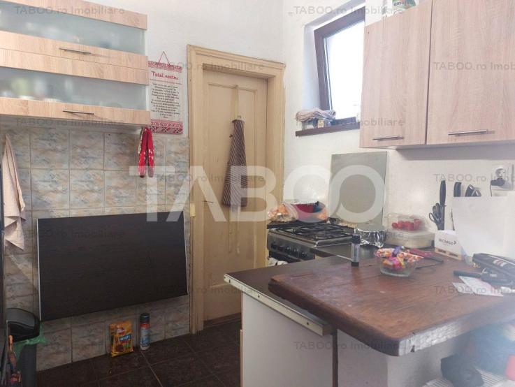 Apartament plus garsoniera la casa 103 mpu intrari separate Cisnadie