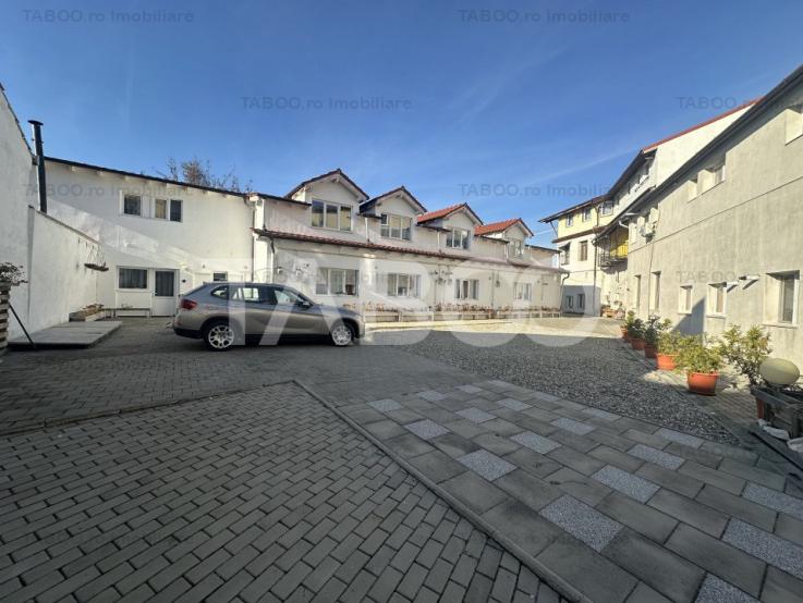 Apartament de vanzare 54 mpu curte si parcare privata Piata Cluj