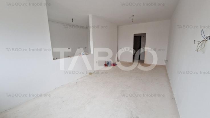 Apartament decomandat de 3 camere 2 bai balcoane parcare subterana